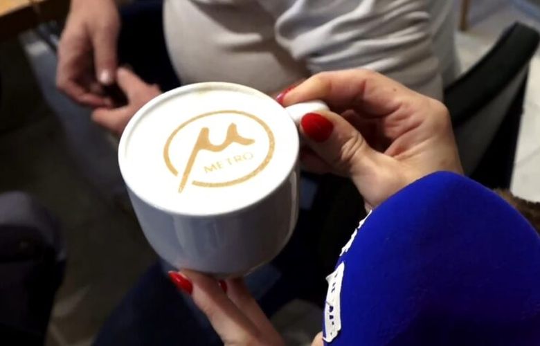 A cafe in Thessaloniki serves cappuccino with the metro logo